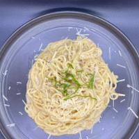 Cacio E Pepe · Spaghetti tossed in a rich creamy parmesan and pepper sauce garnish with fresh basil and par...