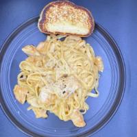 Chicken Fettuccini  · Sauteed dice chicken with smoky alfredo sauce on bed of fettuccini noodles served with garli...