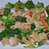 Drunken Noodle Dinner · Pad Khee Mao. Rice noodles, garlic, tomatoes, mushrooms, onions, basil, chili, broccoli, Chi...