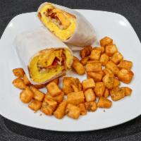 Breakfast Wrap · Bacon, eggs, cheese and hash browns with a side of fruit.