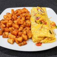 Everything Omelette · Diced ham, peppers, onions, mushrooms, tomatoes and American cheese.