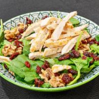 Spinach Arugula Salad · Grilled chicken, baby spinach, arugula, cranberries and walnuts with raspberry vinaigrette d...