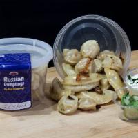 Mix and Match! - Cooked Russian Dumplings, Organic Flour, 16oz · A 16oz container of our frozen Russian dumplings cooked in bay leaves, mixed with butter, an...