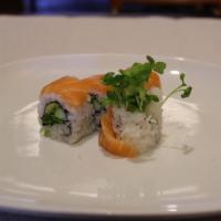 Daikon Roll · 8 pieces. Cucumber, avocado, radish sprout and salmon on top.