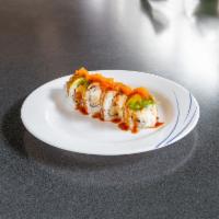Dragon Roll · 8 pieces. Shrimp tempura, crab salad, cucumber, and unagi, avocado, and masago on top with u...