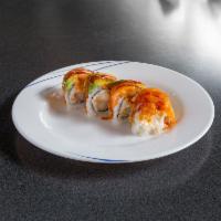 K-2 Roll · 8 pieces. Crab salad, cucumber, shrimp tempura with seared salmon and avocado on top with sr...