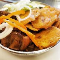 Griot · Slow-cooked or deep-fried pork served with rice of your choice or Plantains with Pikliz & Cr...