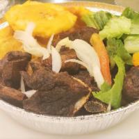 Fried Goat ·  Slow-cooked or deep-fried goat served with rice of your choice, or Plantains with Pikliz & ...