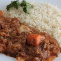 Legume · Mixed vegetable and smoked beef stew served with rice and side of black bean sauce & Pikliz