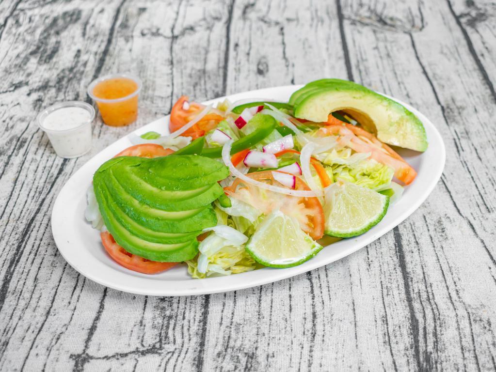 Avocado Salad Plate · Almond, lettuce, tomato, avocado, onion, radish cheese, and sour cream.