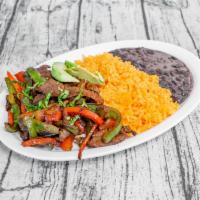 Steak Fajitas Plate · Steak with onion green and red pepper, and rice, beans and avocado