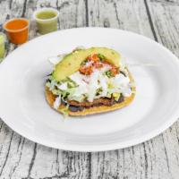 Steak Sope · Bistec. Beans, lettuce, tomato, sour cream, guacamole and cheese, frijol, lechuga, tomate, c...