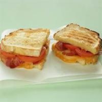 Country Grilled Cheese Sandwich · On country white with 4 cheese blend, hardwood smoked bacon, and tomatoes.