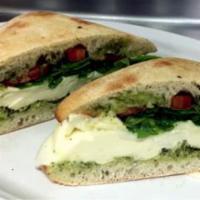 COLD Caprese Sandwich · Vegetarian. On ciabatta with fresh mozzarella, tomatoes, arugula and basil pesto.
