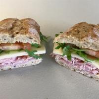 Hot Ham & 2 Cheese Sandwich · On multigrain with NY cheddar, Swiss, tomatoes, arugula, and Dijonnaise.