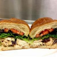 ABP's Original Chicken Salad · on Croissant, with chicken, cranberries and toasted almonds mixed with mayo, tomatoes and fi...