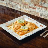 Chicken Francese · Chicken breast dipped in egg with white wine lemon sauce.