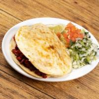 Gorditas · Corn tortilla stuffed with beans, lettuce, tomato and your choice of meat.