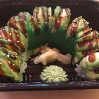 S3. Dragon Special Roll · Eel and cucumber topped with avocado, with kabayaki sauce.