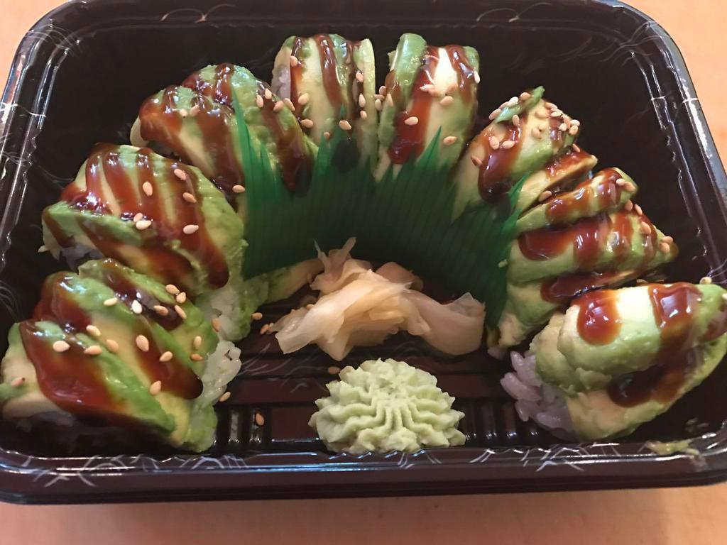S3. Dragon Special Roll · Eel and cucumber topped with avocado, with kabayaki sauce.