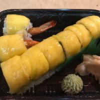 S9. Mango Special Roll · Tempura shrimp, avocado, and mango on top, with kabayaki mango sauce.