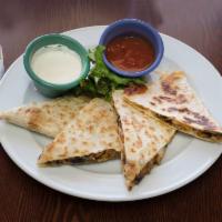 Chicken Quesadilla · Served with guacamole and sour cream. Sauteed mushrooms, peppers and onion with melted fresh...