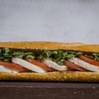 Caprese Sandwicheez · Hot or cold. Fresh mozzarella, tomatoes, basil, olive oil and balsamic vinegar.