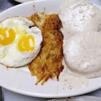 Biscuits and Gravy · Homemade buttermilk biscuits covered in homemade sausage gravy 2 eggs, golden hash browns
