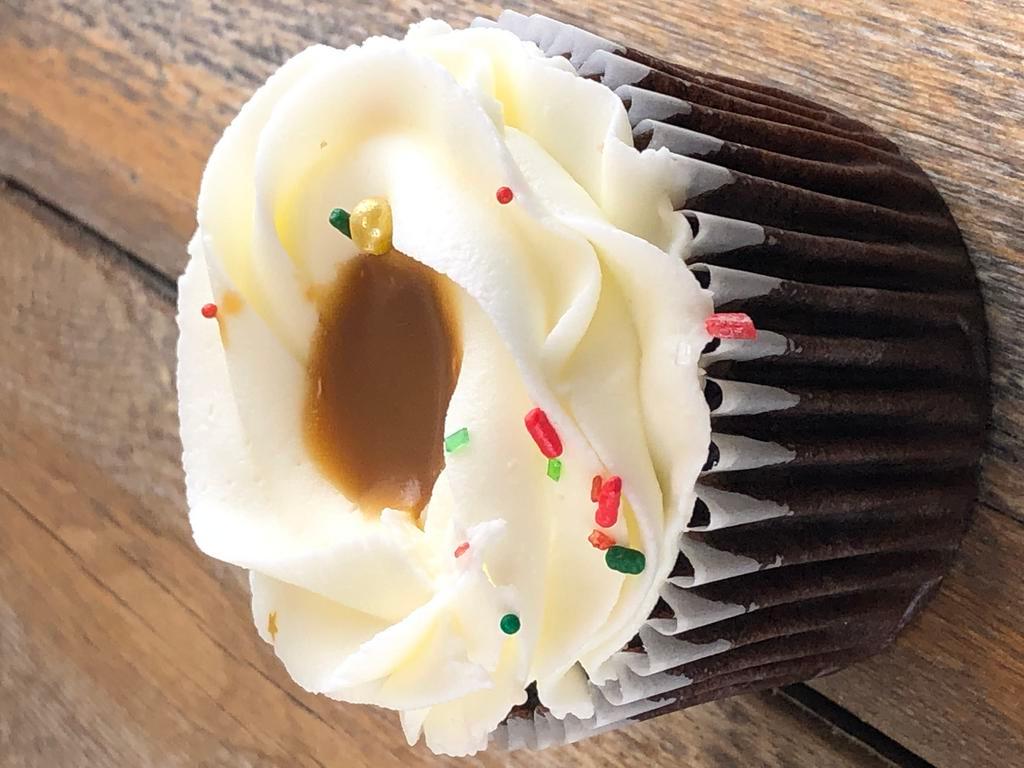 Chocolate Salted Caramel Cupcake · Chocolate Cupcake with vanilla buttercream frosting, homemade salted caramel, and sprinkles