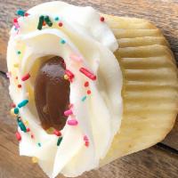 Vanilla Salted Caramel Cupcake · Vanilla cupcake with vanilla buttercream frosting, homemade salted caramel, and sprinkles