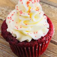Red Velvet · Red velvet cupcake with cream cheese frosting and sprinkles