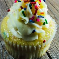 Birthday Cake Cupcake · Birthday cake cupcake with birthday cake buttercream frosting. Sprinkles are in both cake an...