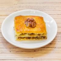 Walnut Baklava · Sweet layered pastry with chopped nuts.