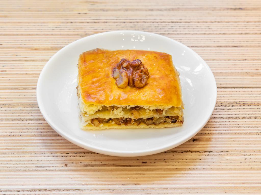 Walnut Baklava · Sweet layered pastry with chopped nuts.