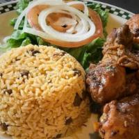 Pollo Guisado Mini Combo · Chicken stew. Served with rice, beans and salad.