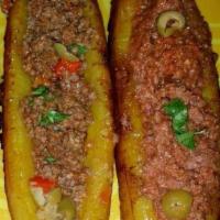 Platano con Carne ( Maduro with Ground beef) · Ripe plantain with ground beef.
Platano Maduro con Carne Molida.