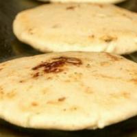 Pupusas Mixta de pollo (Mix Chicken Pupusas) · Pupusas thick griddle cake made of corn flour filled with chicken and cheese. Accompanied wi...