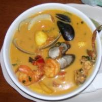 Sopas de Mariscos (Seafood Soup) · Seafood soup Clams, Shrimps, Fish, Conch meat made to perfection with coconut milk. Brings a...