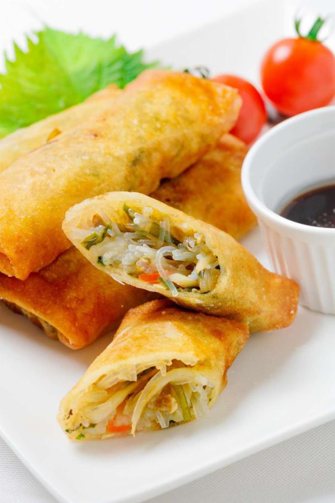 Vegetable Spring Rolls · 4 pieces. Cabbage, carrots, glass noodles, shiitake mushrooms, served w/Thai sweet chili sauce.