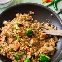 Thai Fried Rice · Green peas, carrots, onions, and eggs.