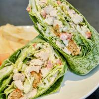 Grilled Chicken Caesar Wrap · The perfect blend of salad and sandwich. Our Classic Caesar Salad with Grilled Chicken added...