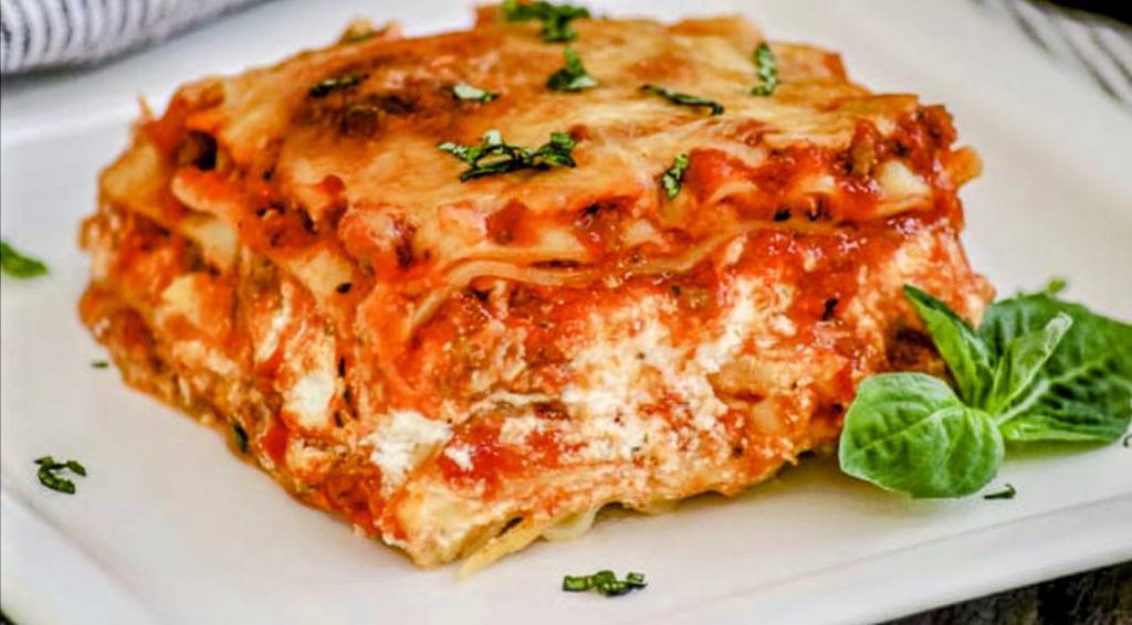 Daily Special: Italian Sausage Lasagna · We've taken our Nonna's Classic Marinara Lasagna topped with fresh provolone, and added slow cooked Italian Sausage. It's flavor, on top of flavor, infused with more flavor. Comes with a personal side of our Parmesan/Garlic Bread. 
Only While Supplies Last...
Mangia!