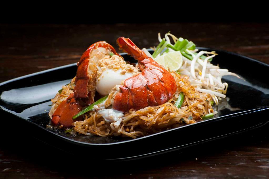 Lobster Pad Thai · Stir fried thin rice noodles, whole lobster, bean sprouts, chives and peanut top with poached egg