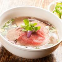 Pho Bo (GF) · 12 hrs cooked beef broth, thin sliced rare beef, brisket, and thin rice noodles served with ...