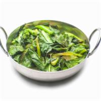 SAUTÉED CHINESE BROCCOLI (V) · Chinese broccoli, chili, and garlic.  