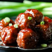 Sweet Chili Meatballs · Beef meatballs slow cooked to perfection and basted with my custom made sweet chili sauce