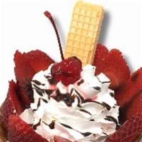 Ice cream bowl · 3 scoops of ice cream. Topped with fresh strawberries, whipped cream, and toppings of choice.