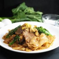 18. Pad See Iw Noodle · Gluten-free. Stir fried wide rice noodles in special sweet soy sauce with egg, Chinese brocc...
