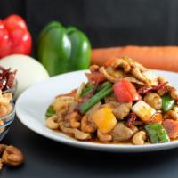 30. Thai Cashew · Spicy. Stir-fried with roasted cashew nuts, mushrooms, carrots, onion, green onion, bell pep...