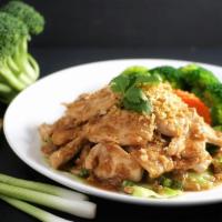 31. Pad Garlic · Homemade stir-fried garlic sauce with black peppers served with steamed vegetables.